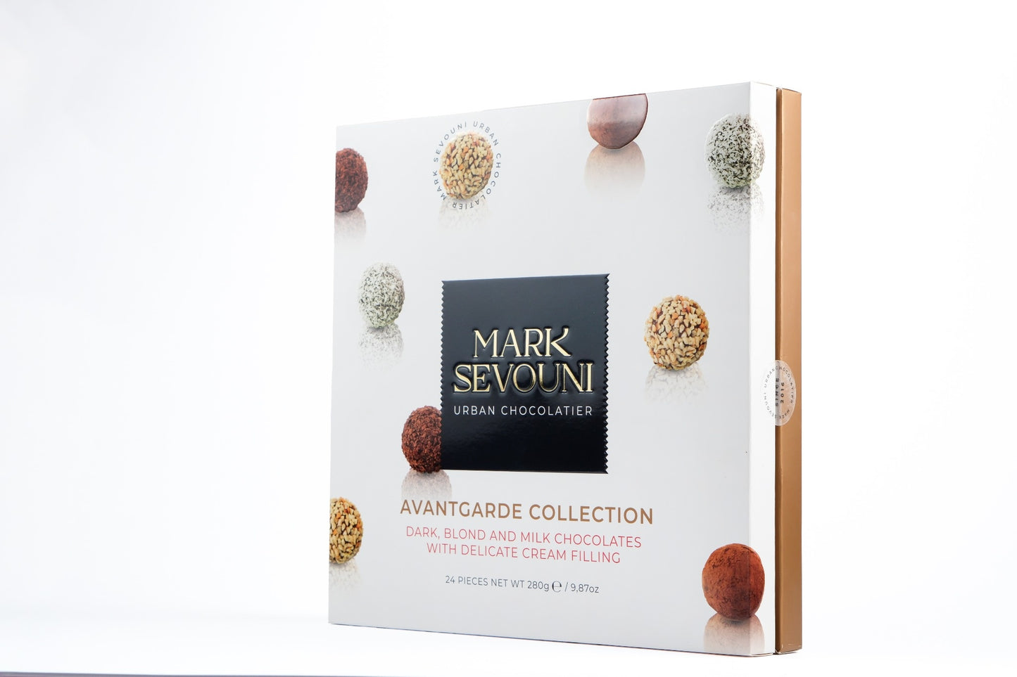 Mark Sevouni Avantgarde Collection – Box of assorted dark, blond, and milk chocolates with cream filling