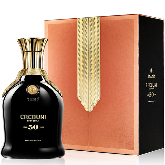 Bottle and box of ARARAT Erebuni 50-Year-Old Armenian brandy featuring a black and gold bottle with a copper-toned box adorned with vertical gold embossing.
