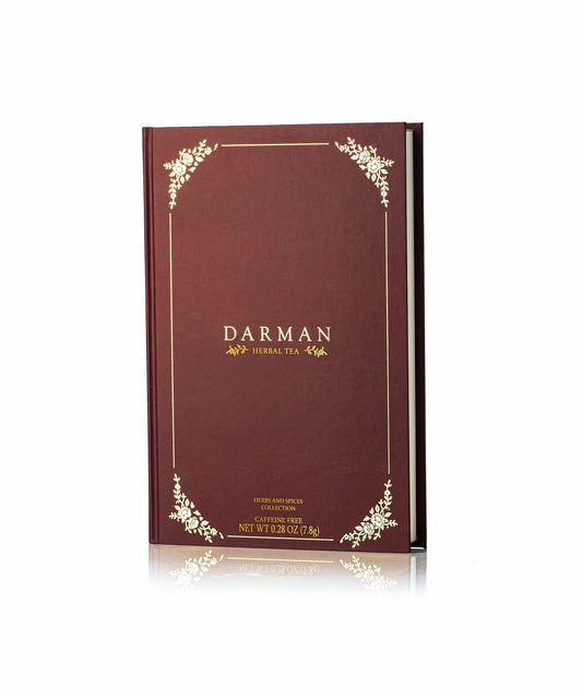 Darman Red Book herbal tea in deep red gift box with gold floral accents