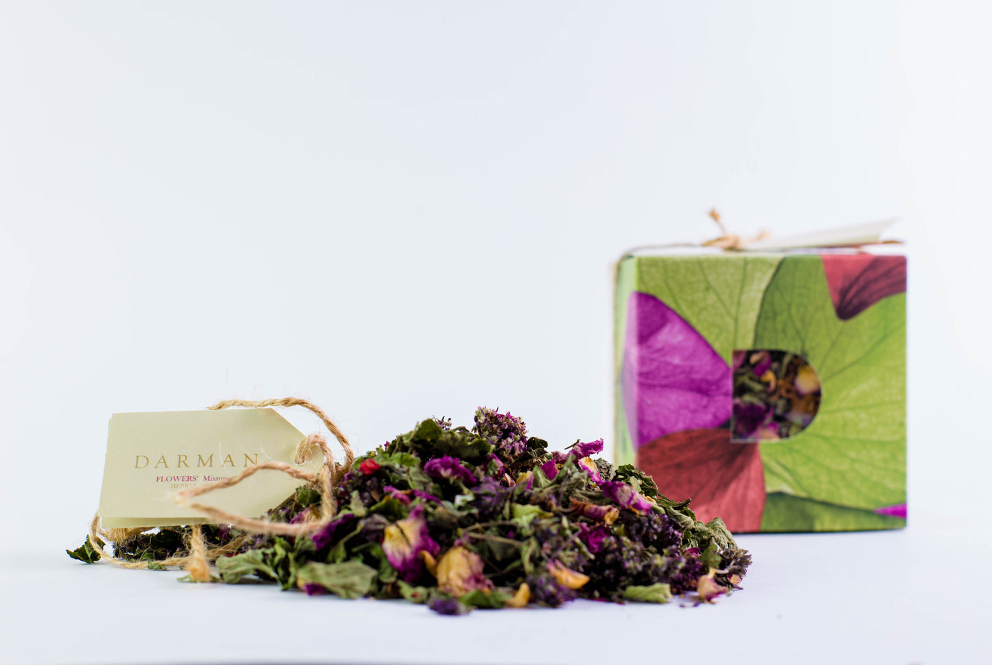 Darman Organic Floral Mixture tea with boxed packaging and dried flower blend on white