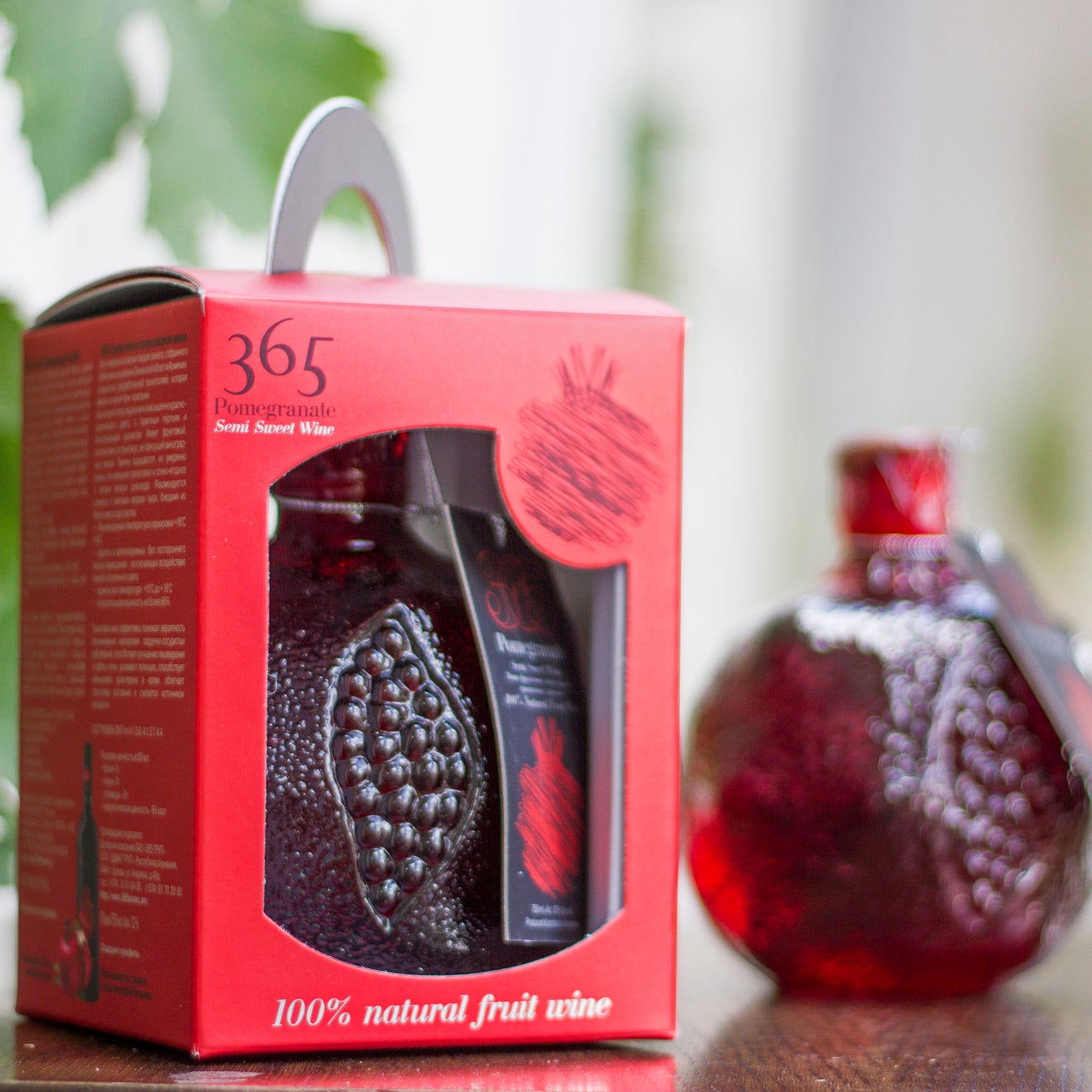 clean product image showing the bottle and gift packaging with visible texture and branding.
