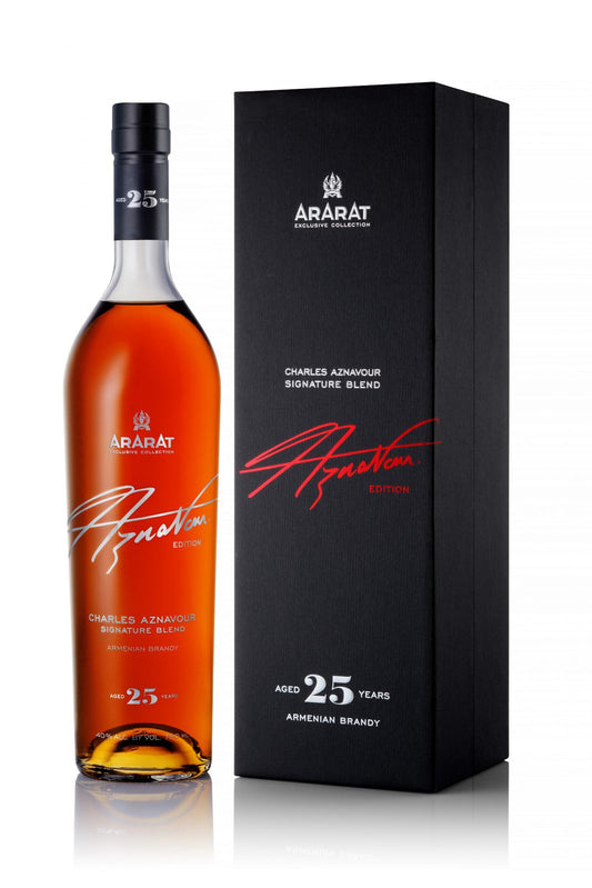 Bottle and box of ARARAT Charles Aznavour Signature Blend 25-Year-Old Armenian brandy with minimalist black packaging and red signature design.