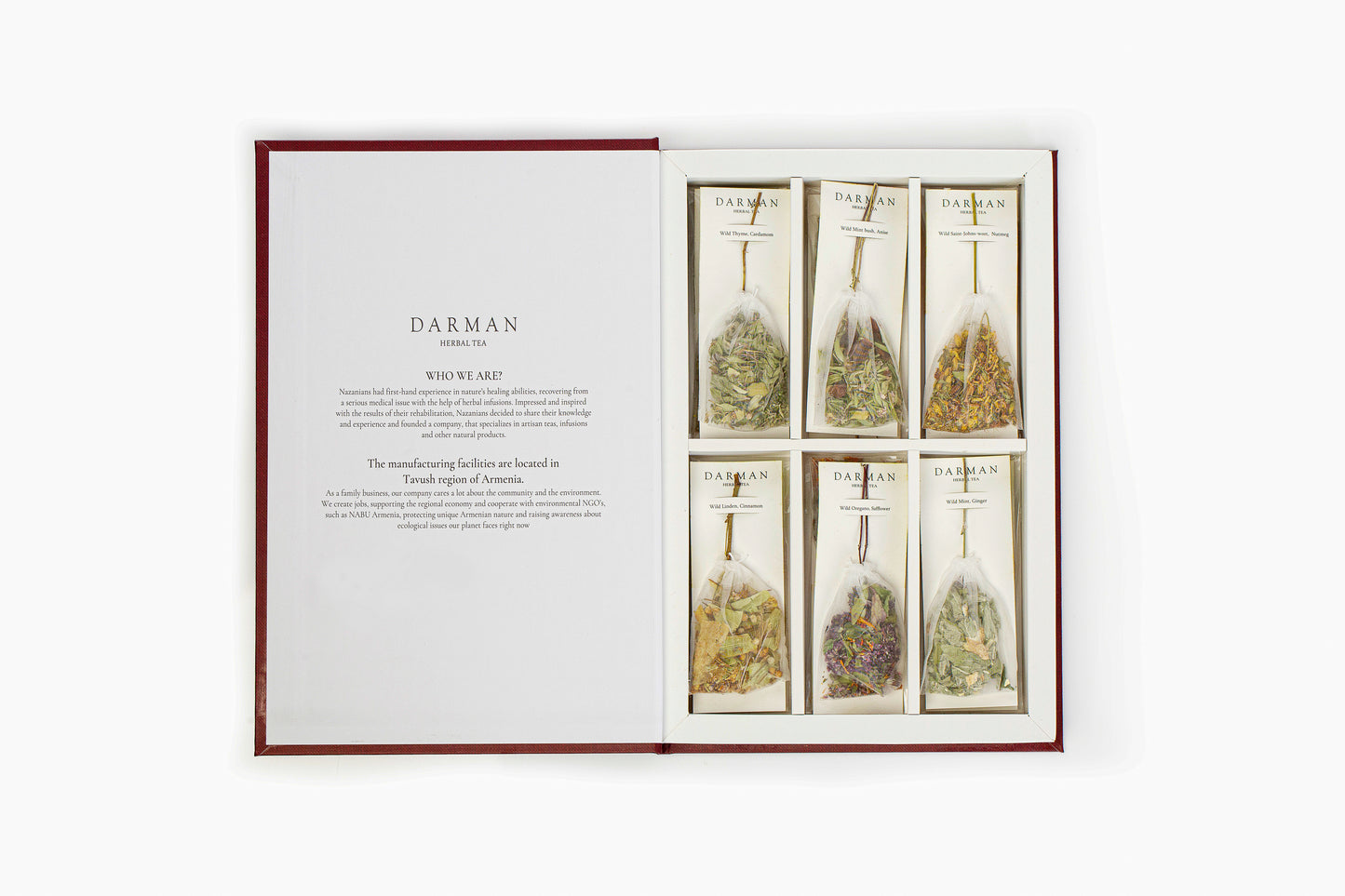 Loose herbal tea blend from Darman Red Book with colorful petals and spices on white background