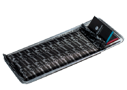 Alt Text:
Premium gift tray of Mark Sevouni Urban Chocolatier chocolate bars wrapped in branded black foil, partially opened to reveal individually packed pieces.