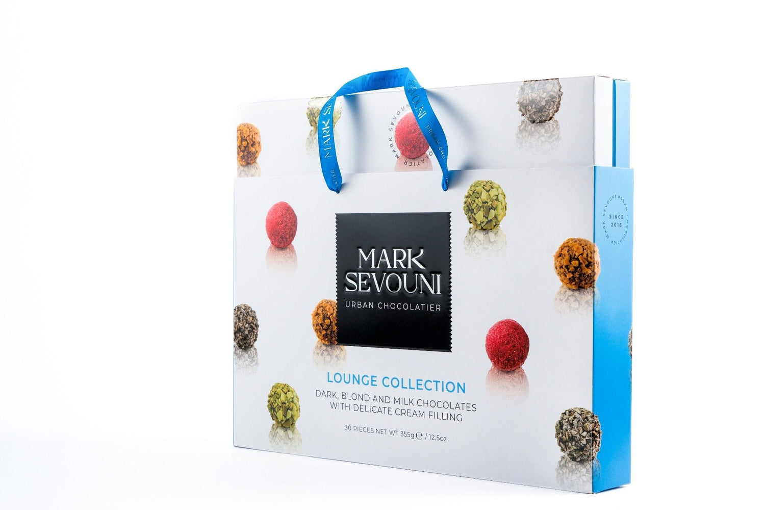 Mark Sevouni Lounge Collection 30-piece chocolate gift box with cream-filled truffles in elegant blue and white packaging.