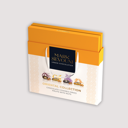 Mark Sevouni Oriental Collection gift box – chocolate-covered dried fruits with nuts in assorted wrapping, luxury confectionery packaging.
