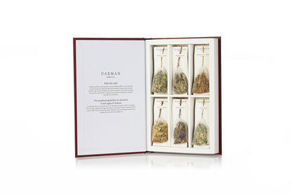 Open Darman Red Book tea gift box with six spice and herb sachets and brand story insert