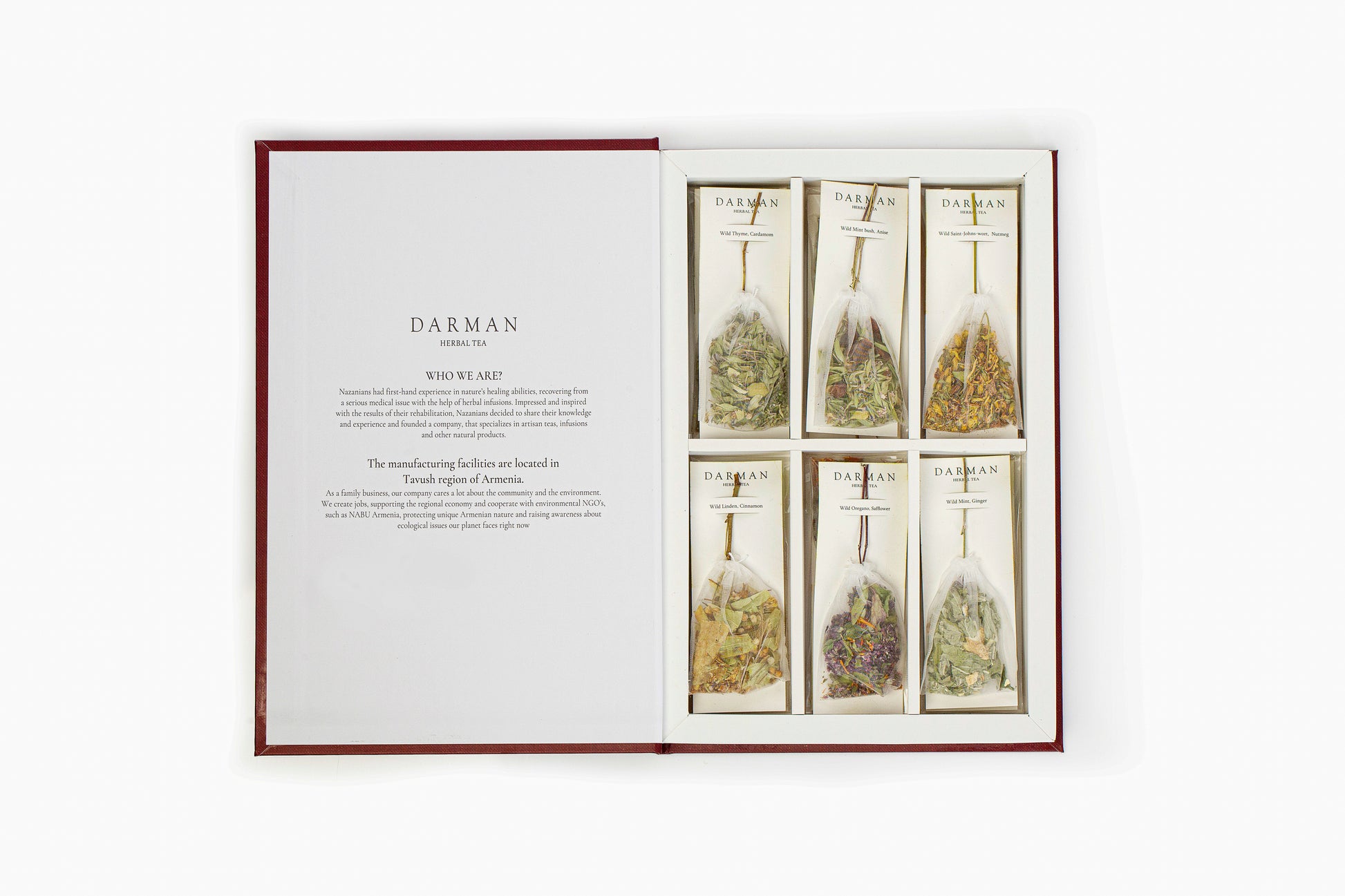 Loose herbal tea blend from Darman Red Book with colorful petals and spices on white background
