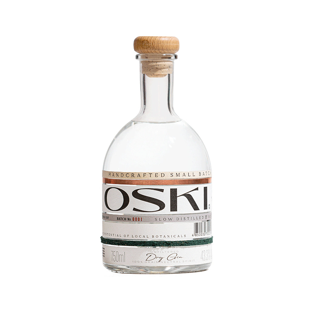 Image Alt Text
Oski Craft Dry Gin bottle with wood cork and minimalist white label, featuring Armenian botanical elements and award seals, 750mL, 43.3% ABV.
